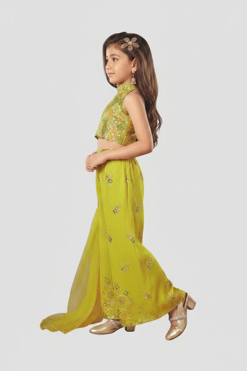 Young girl wearing a yellow floral dress on a white background