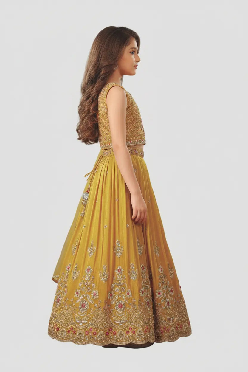 Woman wearing a yellow embroidered dress on a white background