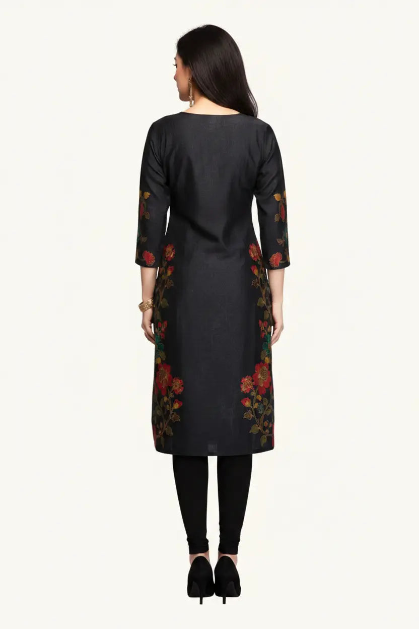 Woman wearing a black kurta with floral patterns on a white background
