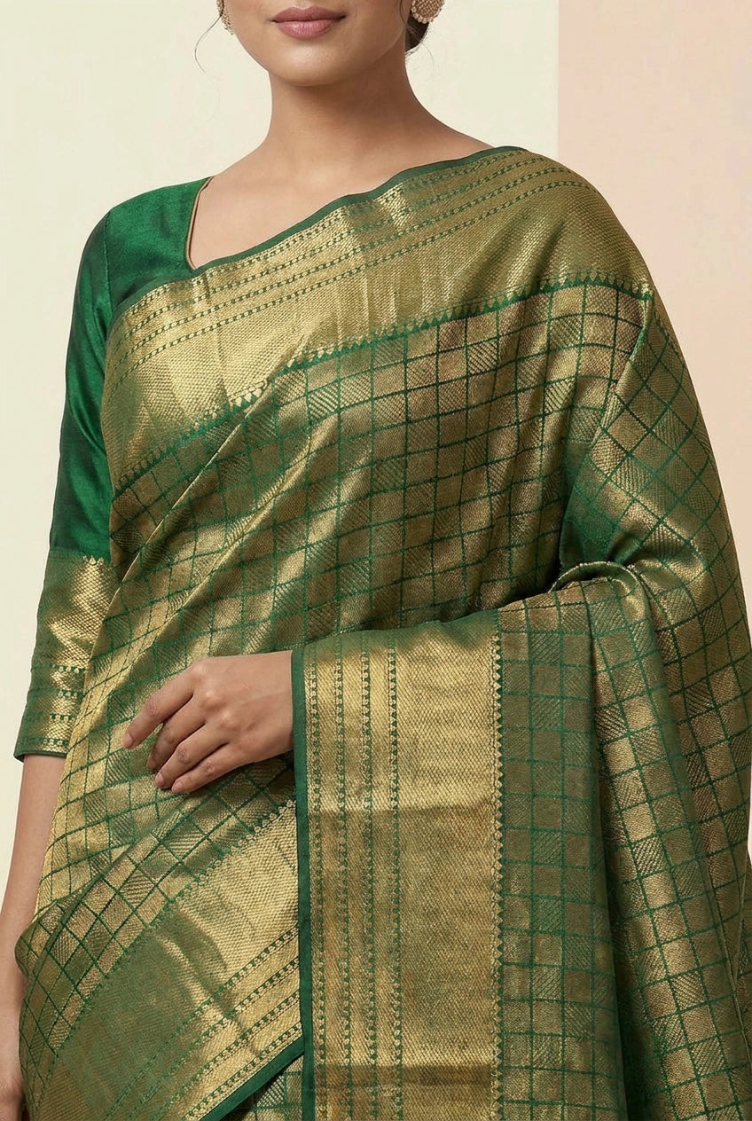 Green saree with a checkered pattern on a neutral background