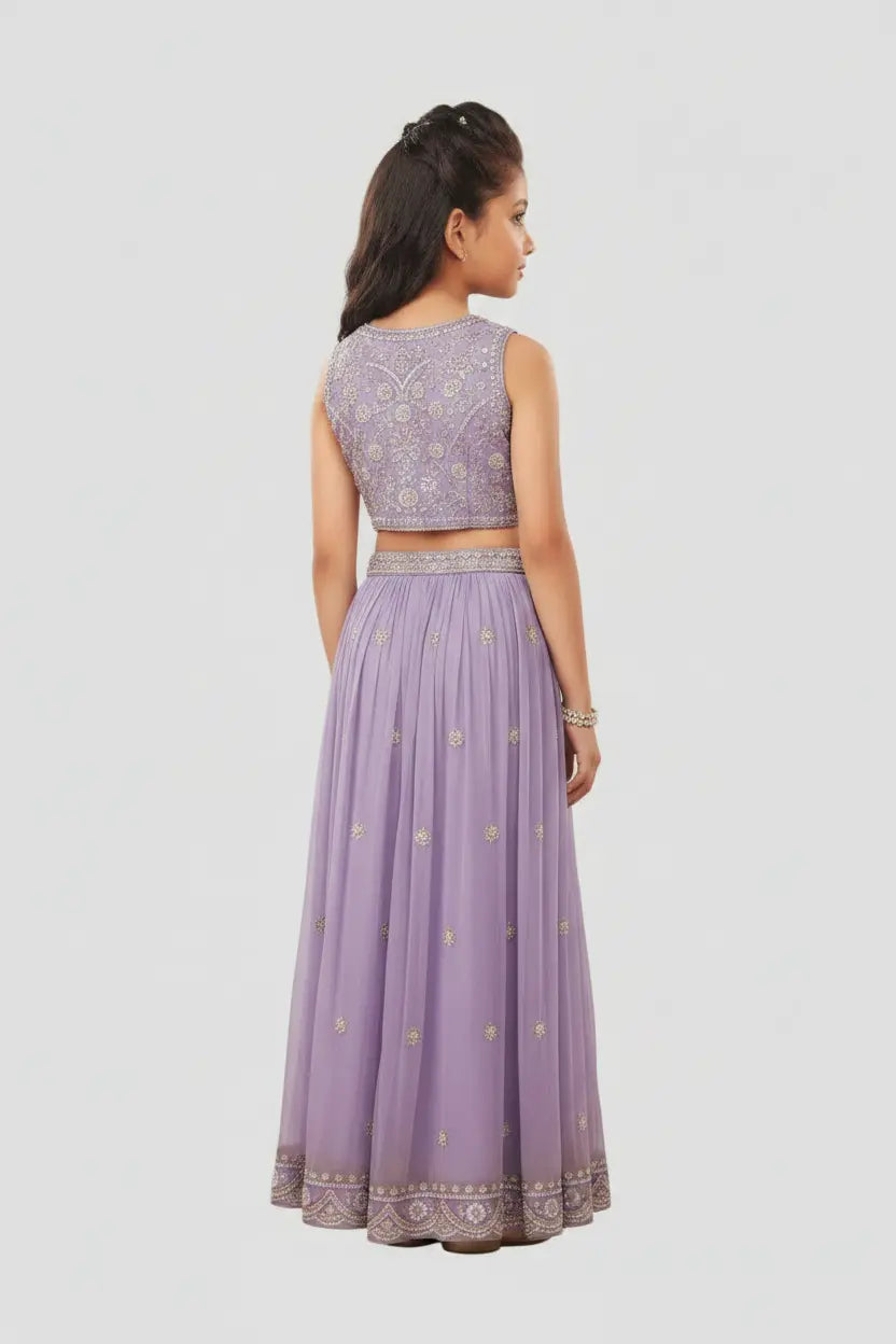 Woman wearing a purple traditional outfit with a white background