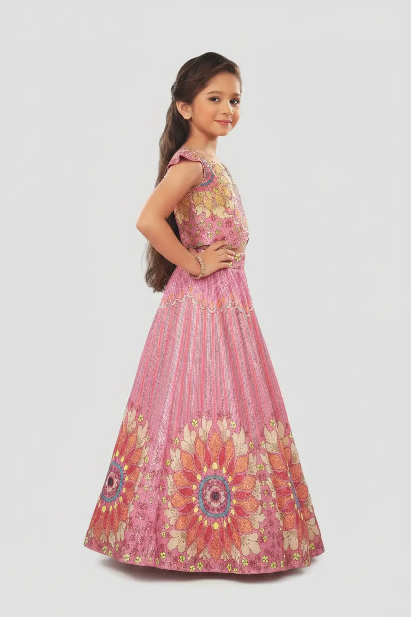 Young girl wearing a pink floral dress on a white background
