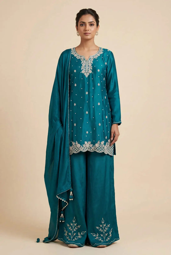 Peacock Blue Silk Palazzo Suit with Zardozi Neck and Floral Hem Embroidery - Rangoli India
