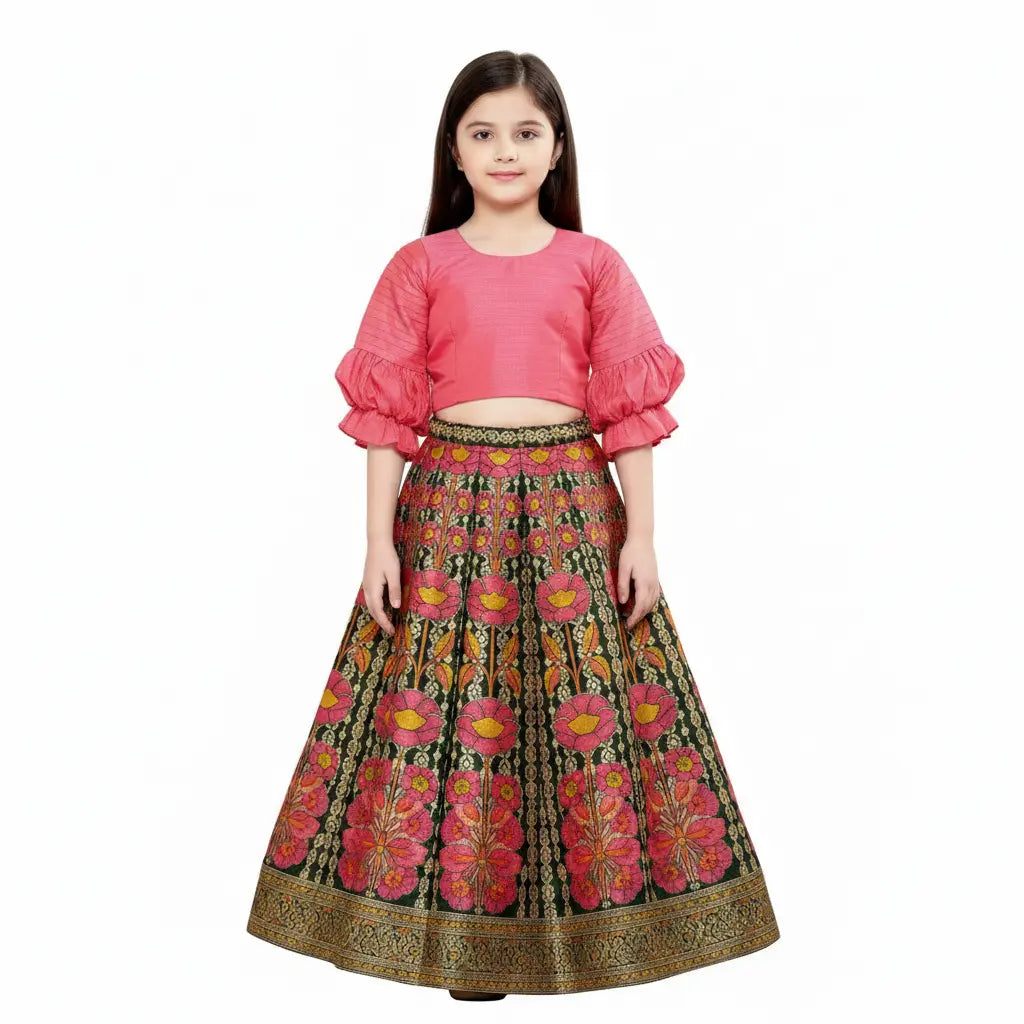 Young girl wearing a pink top and floral skirt on a white background