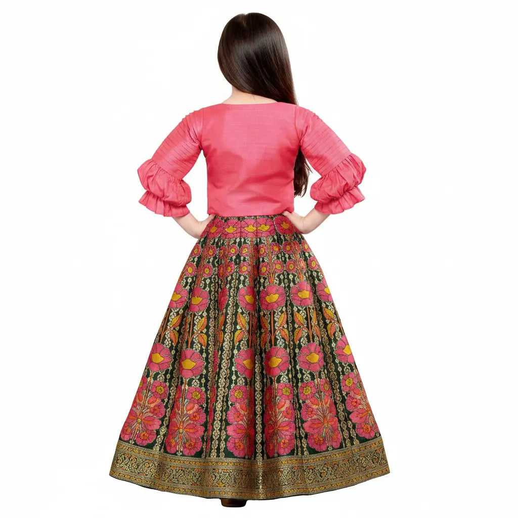 Woman wearing a pink blouse and floral skirt on a white background