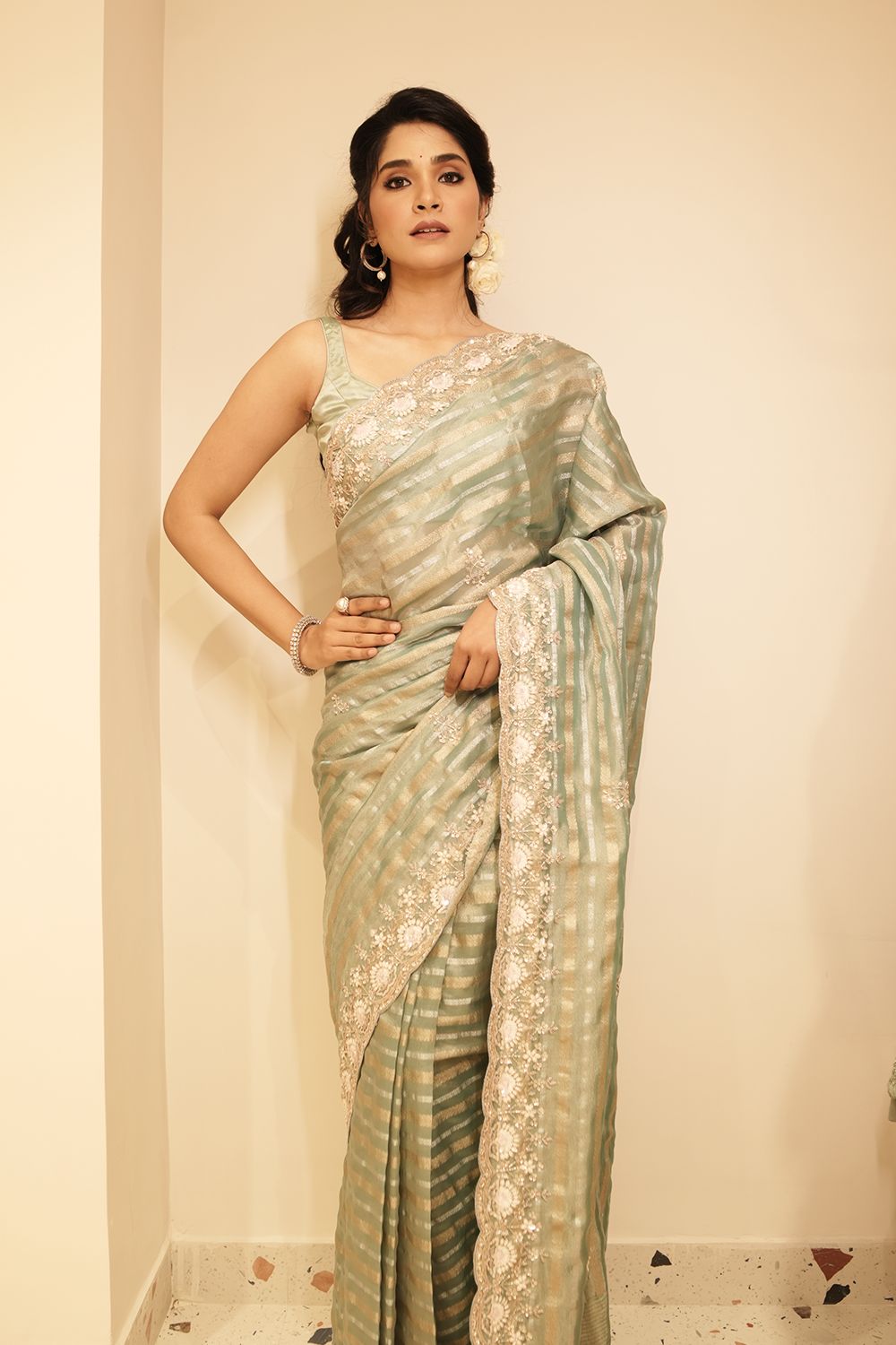 Elegant Firozi Blue Tissue Weave Saree with Embroidered Border