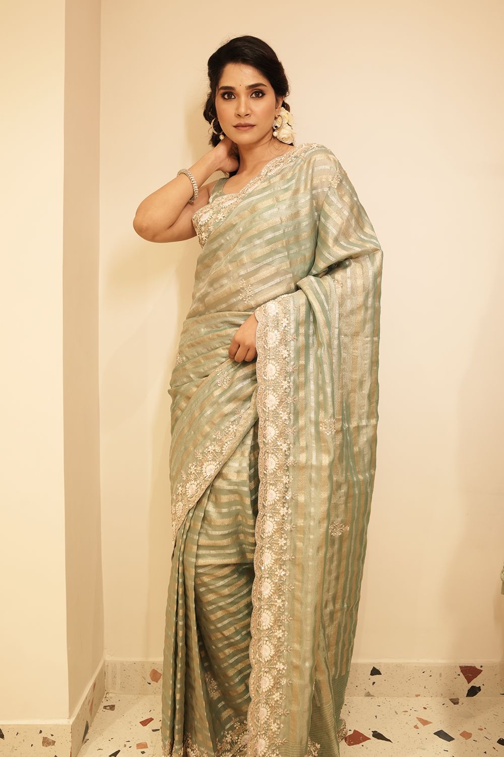 Elegant Firozi Blue Tissue Weave Saree with Embroidered Border