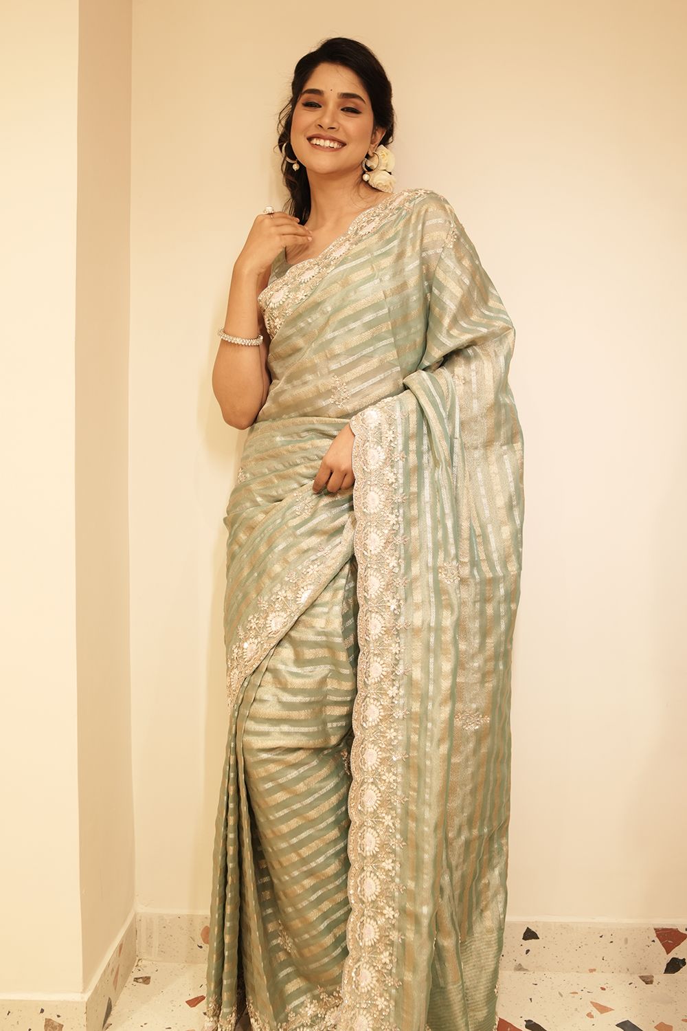 Elegant Firozi Blue Tissue Weave Saree with Embroidered Border