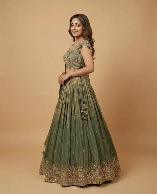 Turquoise Fandy Tissue Croptop Lehenga with Gold Border - Rangoli India