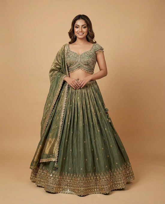 Turquoise Fandy Tissue Croptop Lehenga with Gold Border - Rangoli India