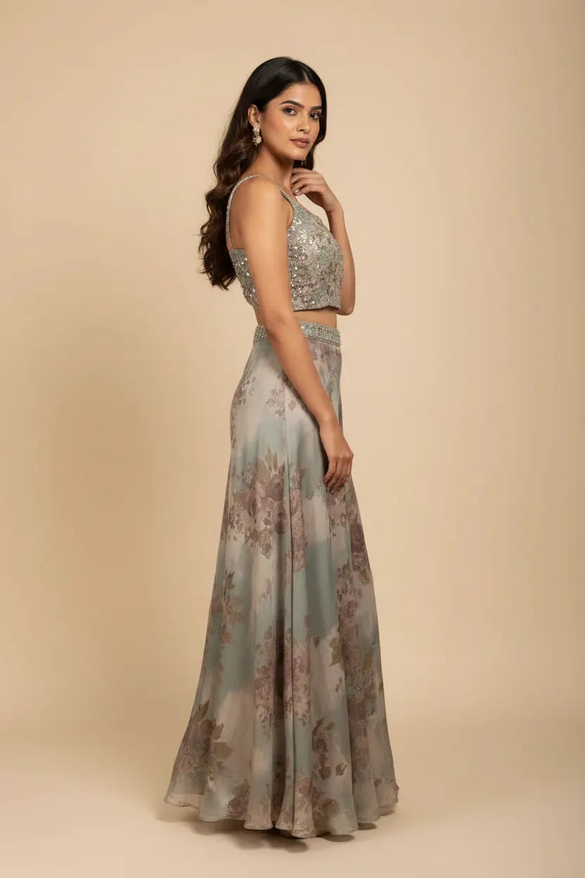 Woman wearing a floral two-piece outfit against a beige background