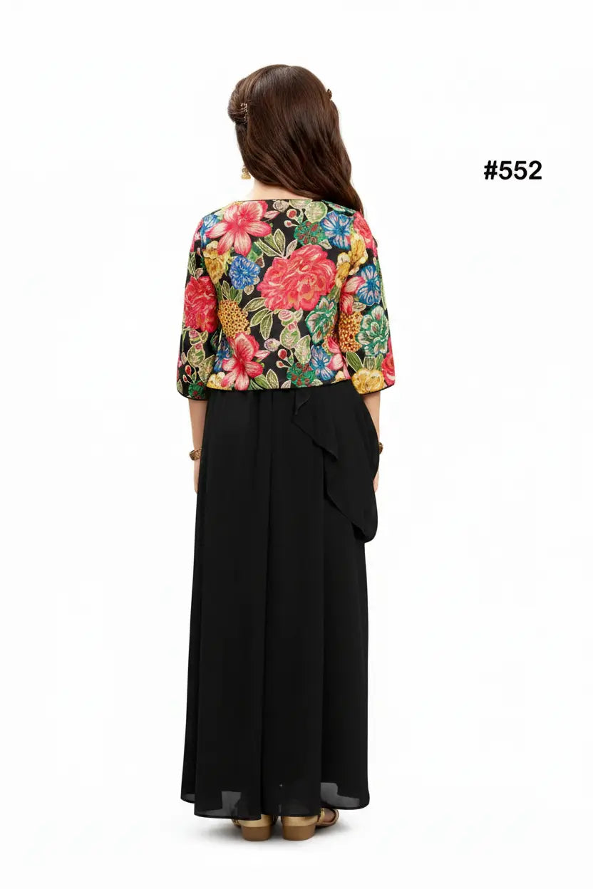 Woman wearing a colorful floral top and black skirt on a white background