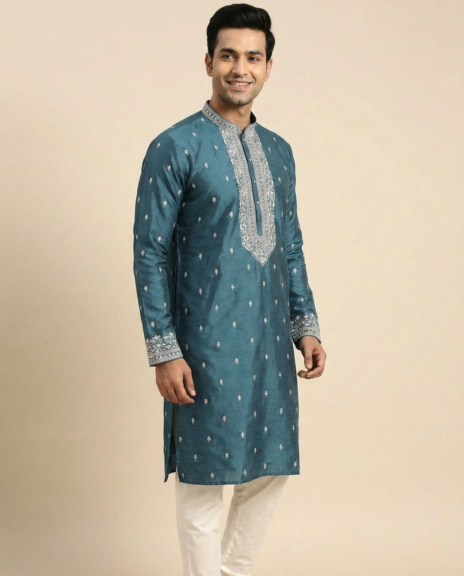 Teal blue silk kurta from the side, embroidered placket and churidar in view
