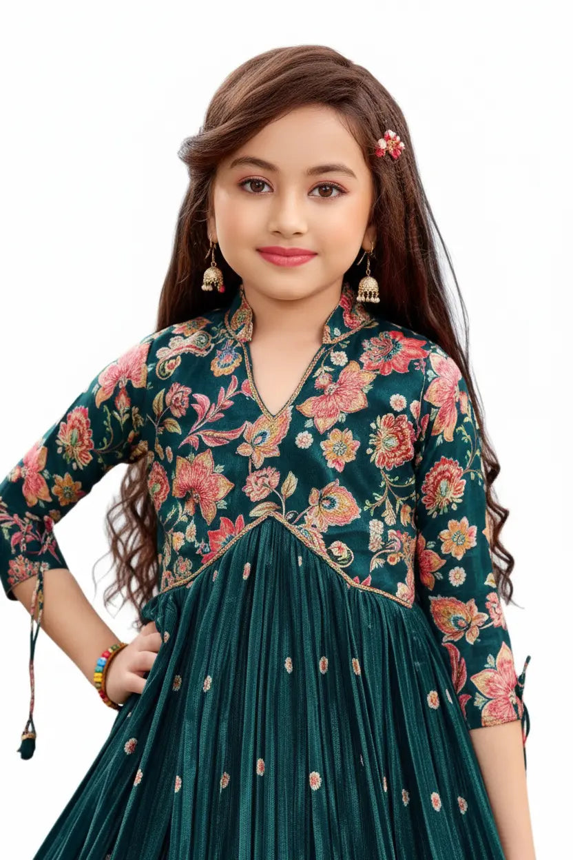 Young girl wearing a green floral dress with a white background