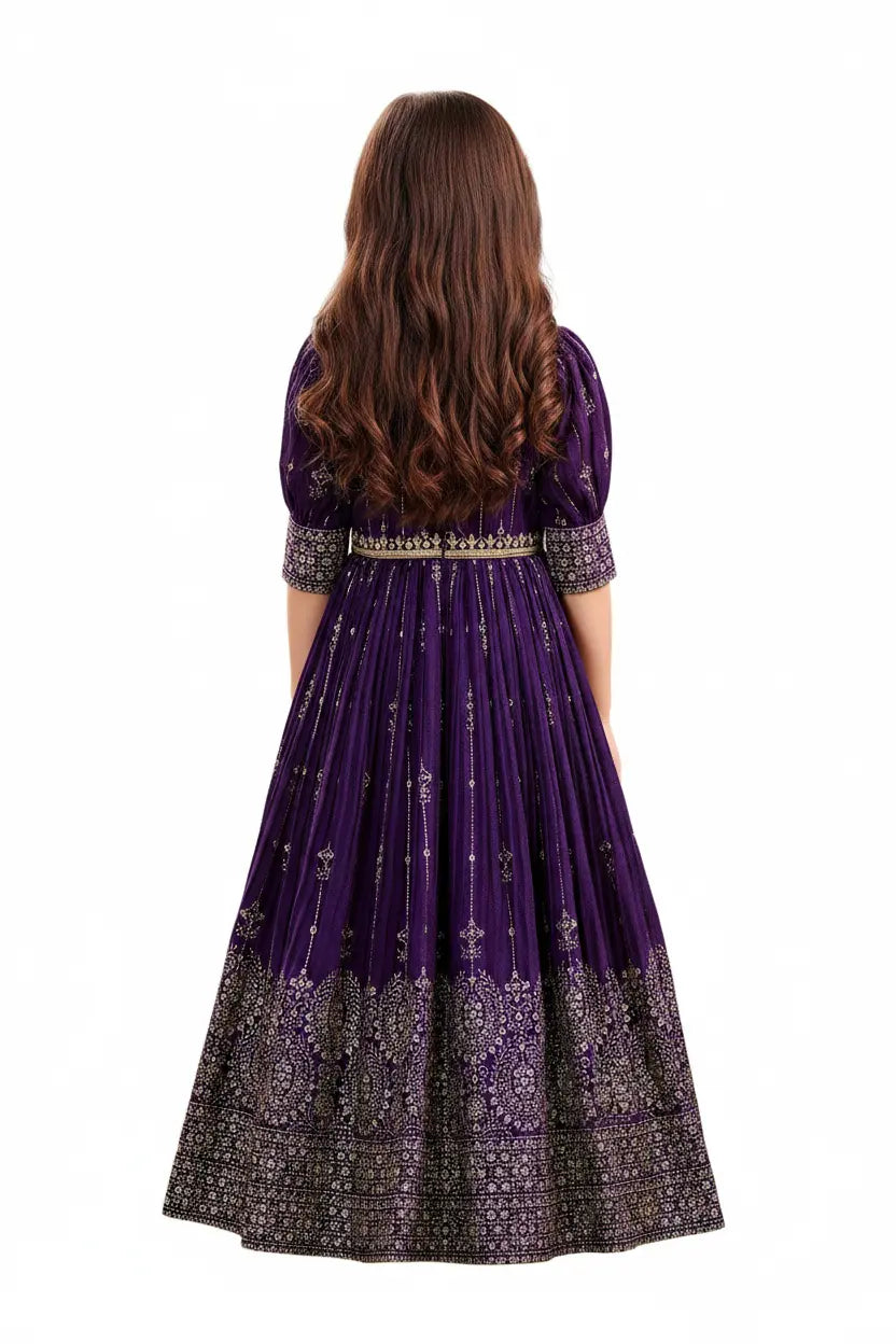 Purple embroidered dress worn by a model on a white background