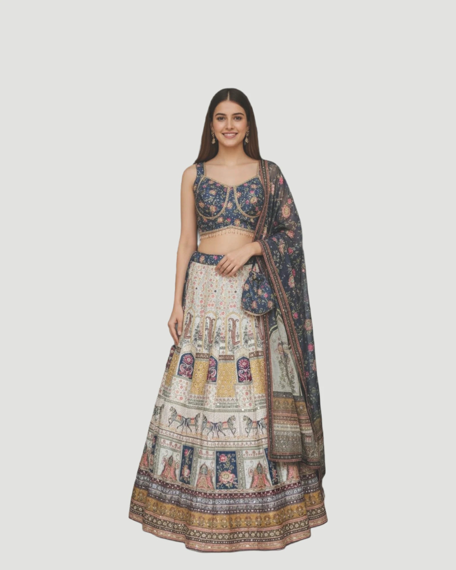 Woman wearing a traditional outfit with a patterned top and skirt on a white background