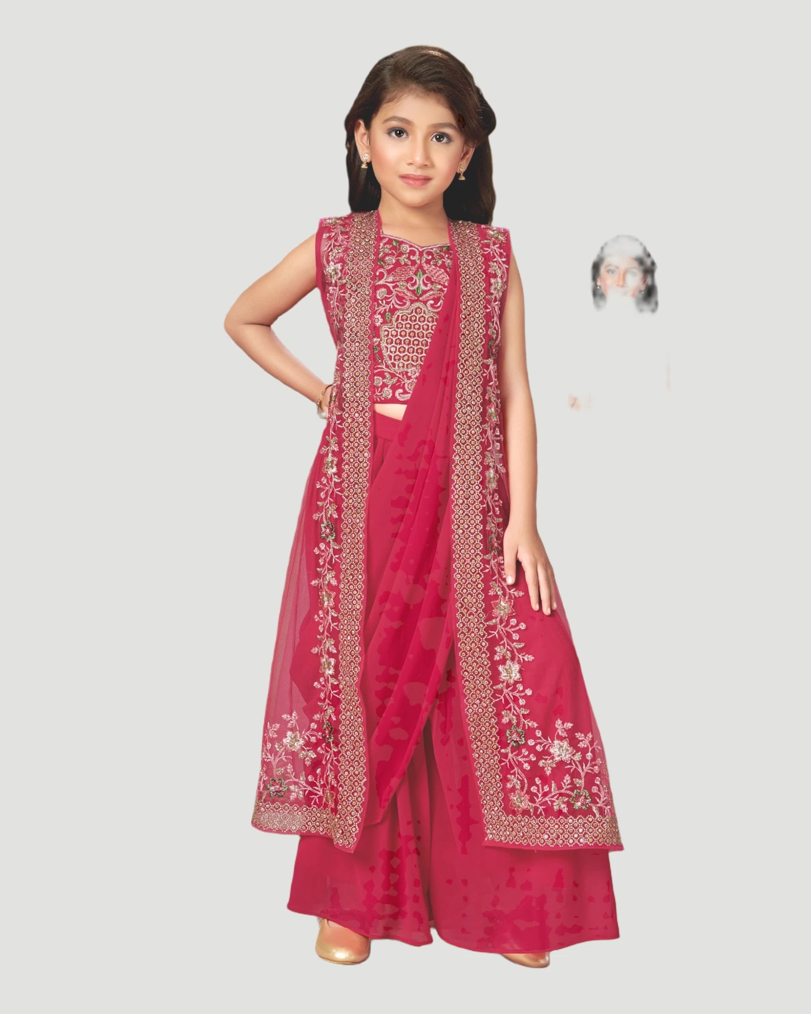 Pink traditional outfit with intricate embroidery on a white background