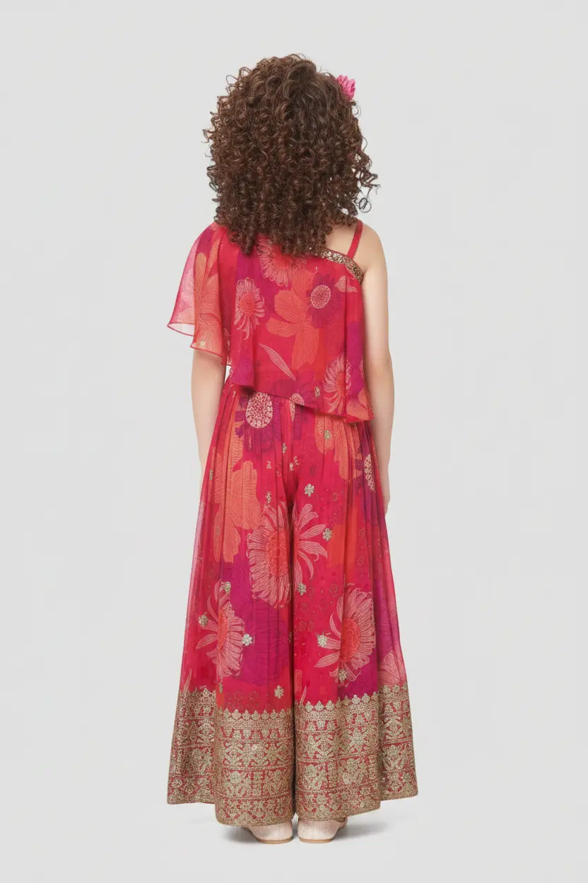 Woman wearing a red floral dress with a white background