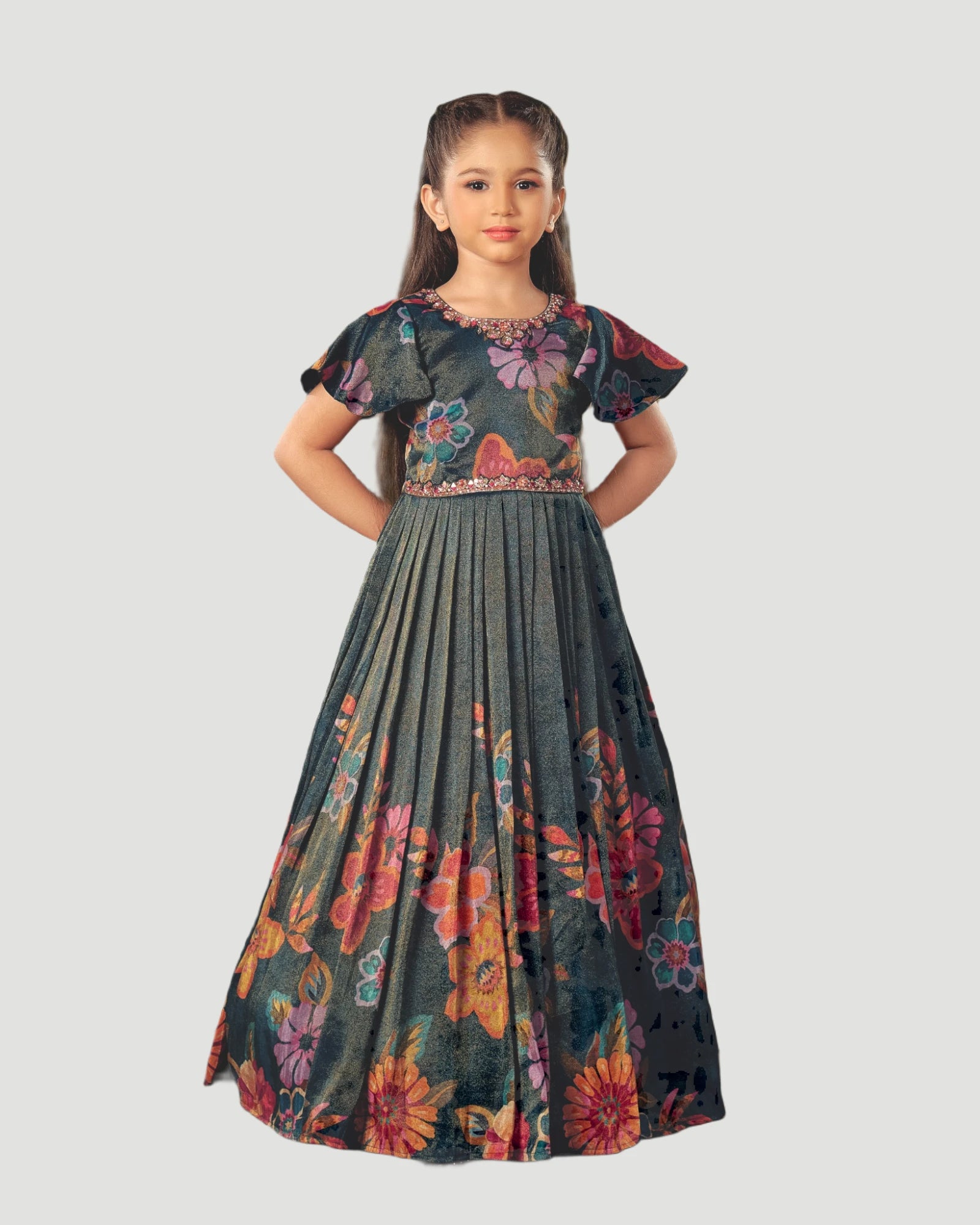 Young girl wearing a floral dress on a white background