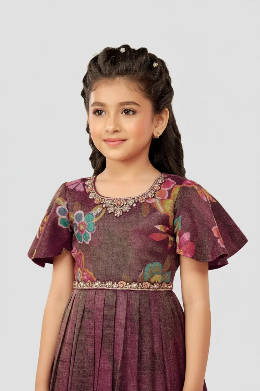 Young girl wearing a purple floral dress on a white background
