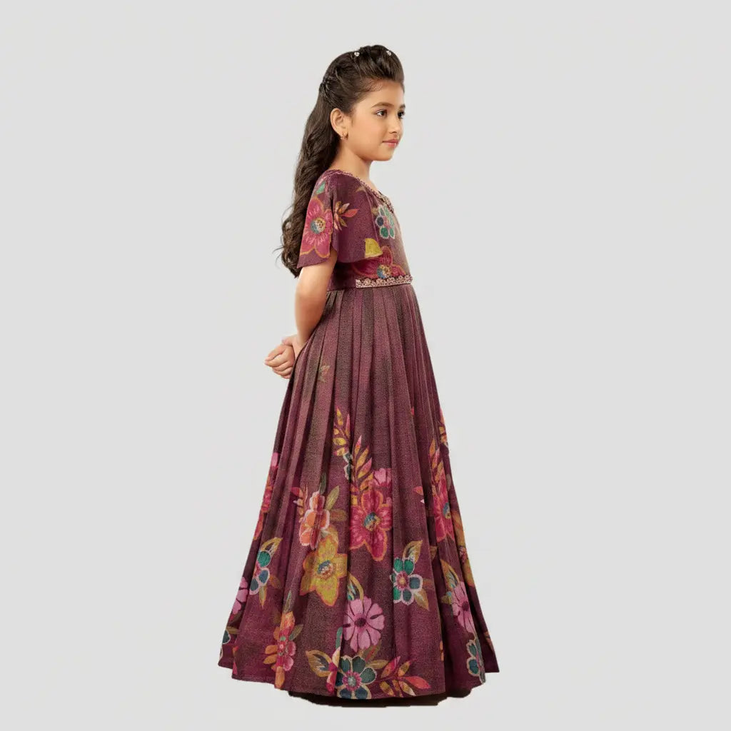 Girl wearing a floral dress on a light gray background
