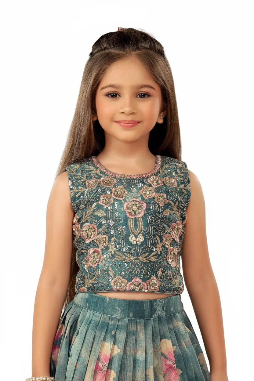 Young girl wearing a floral top and skirt set on a white background