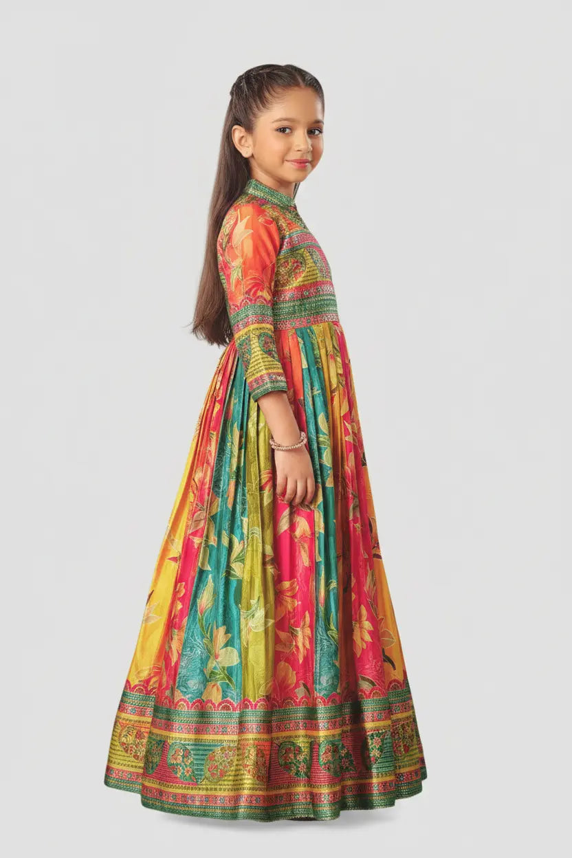 Young girl wearing a colorful traditional dress on a white background
