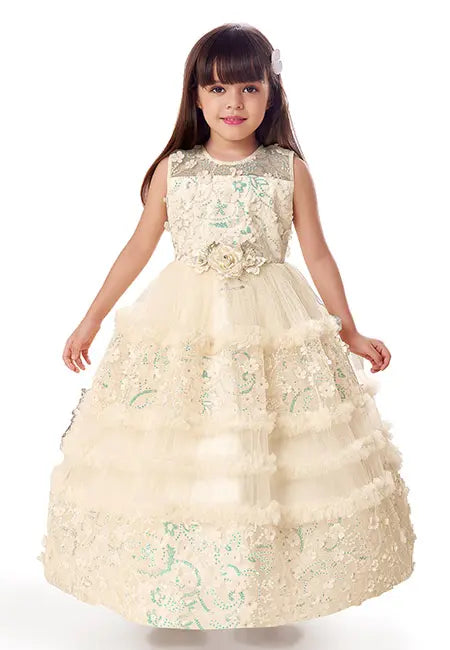 Young girl wearing a white floral dress on a white background