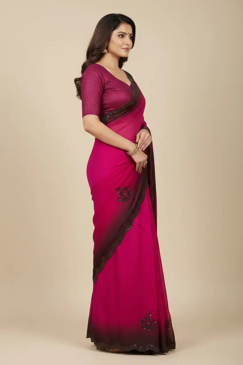 Woman wearing a pink saree with a brown border on a beige background
