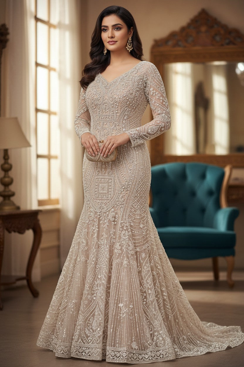 Pink Net Anarkali Gown with Cutdana Hem for Festive Reception