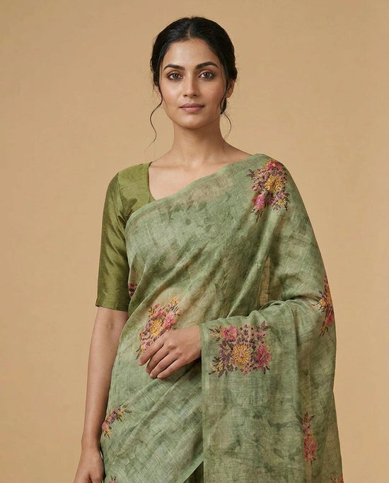 Linen Tissue Saree with Hand-Embroidered Zari Floral Border by Rangoli