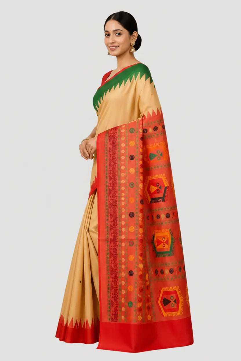 Woman wearing a traditional saree with a beige, green, and red pattern on a light gray background