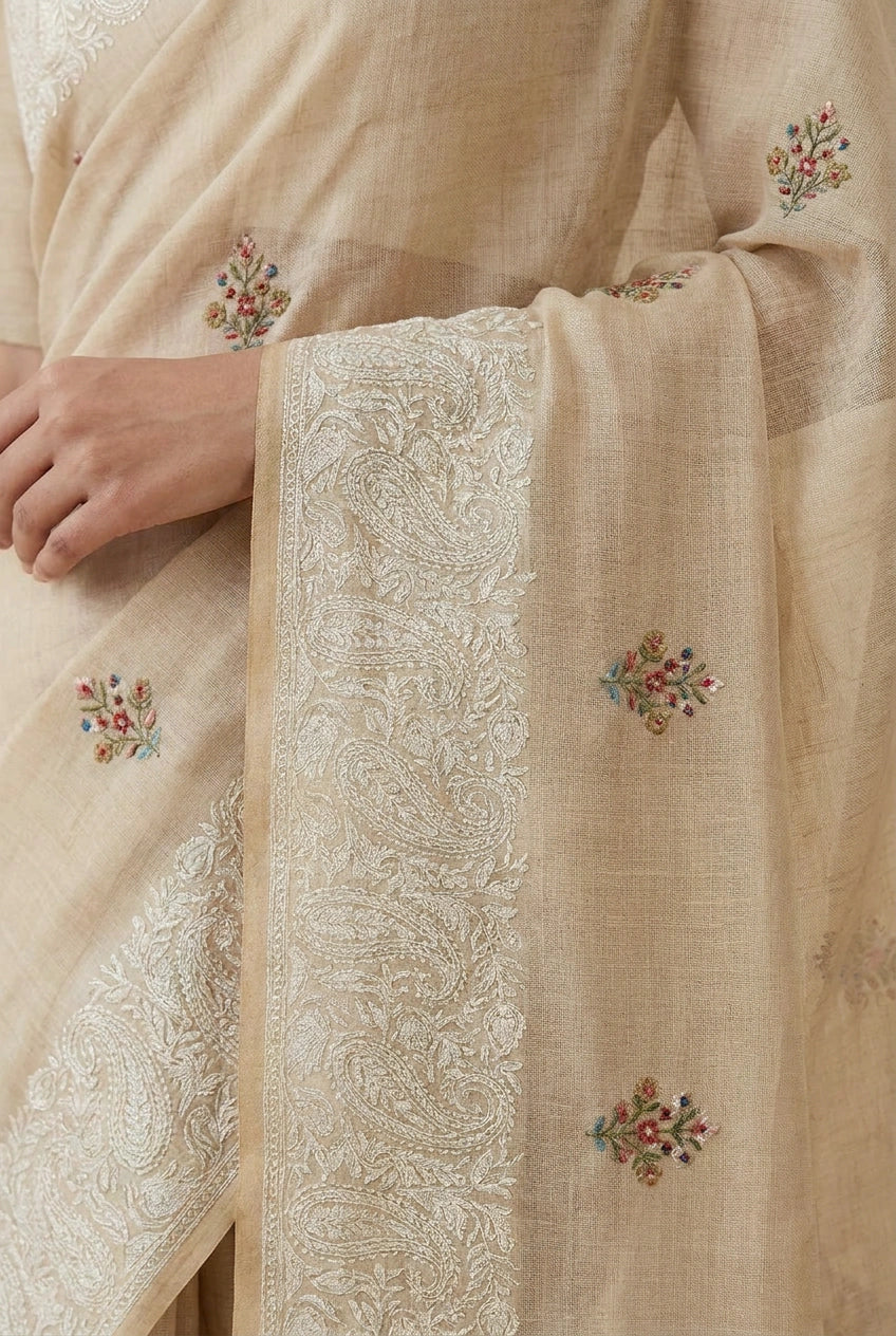 Beige saree with floral embroidery details