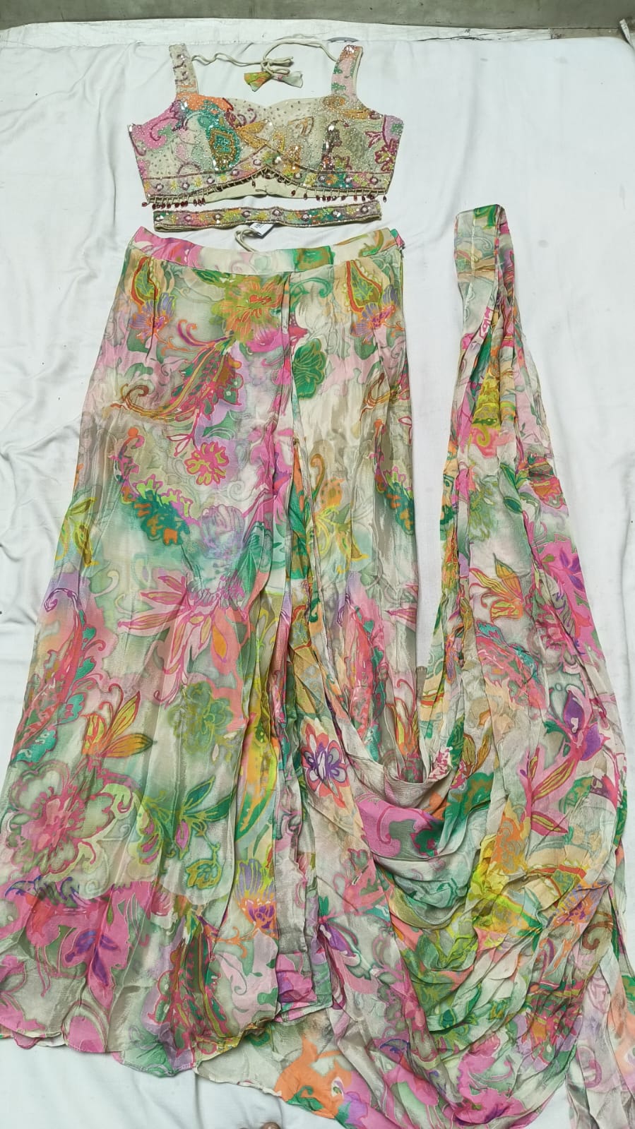 Graceful Pastel Floral Drape Saree with Intricate Blouse Work