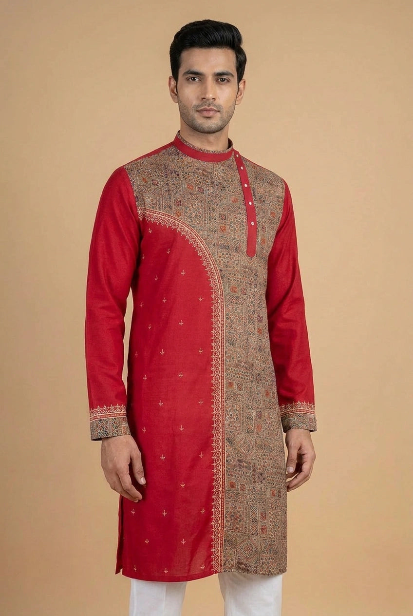 Man wearing a red and brown traditional kurta against a beige background