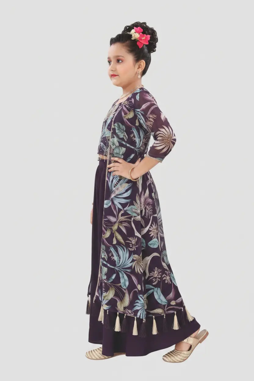 Woman wearing a floral dress with tassels on a white background