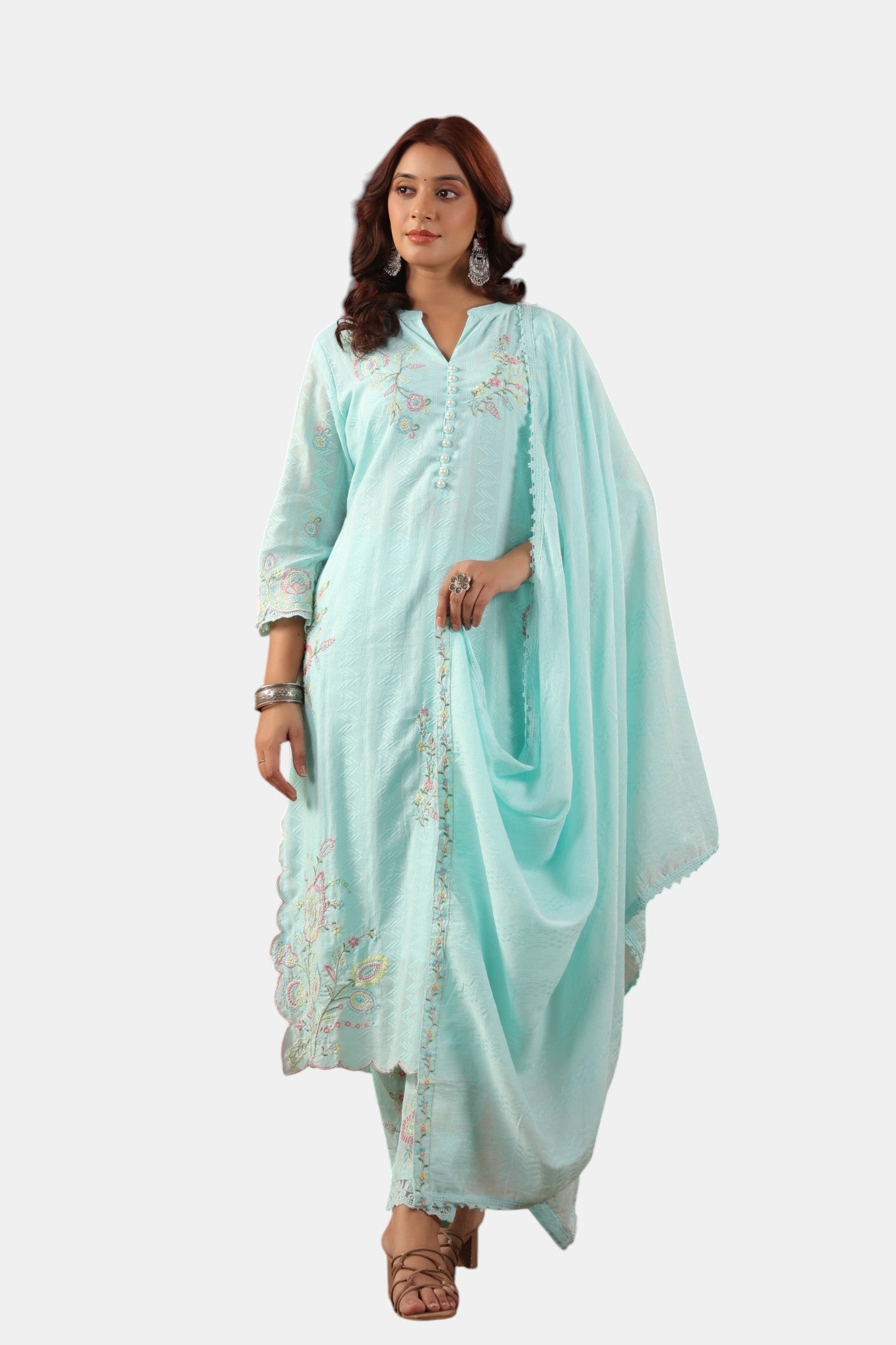 Rangoli light blue textured cotton kurta set with floral embroidery on neckline, sleeves, and hem. Includes matching pants and dupatta.