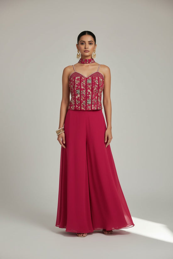 Rangoli magenta georgette crop top and wide leg pants set with embroidery and choker neckline.