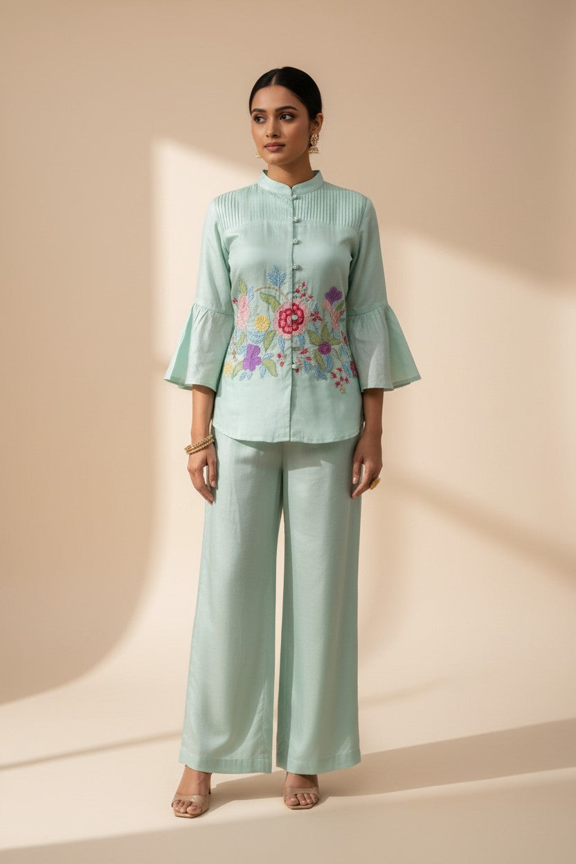 Rangoli mint green embroidered bell sleeve top and palazzo pants set. Lightweight fabric with floral embroidery.