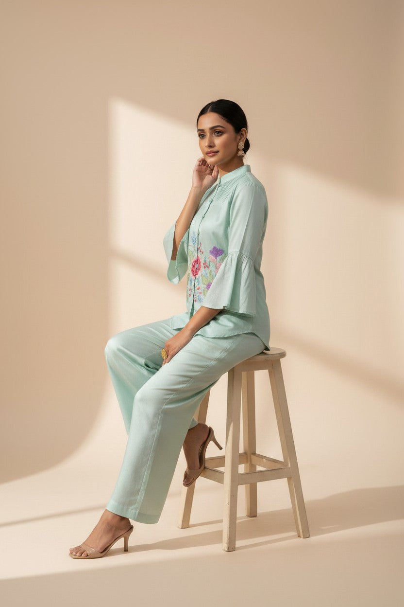 Rangoli mint green embroidered bell sleeve top and palazzo pants set. Lightweight fabric with floral embroidery.