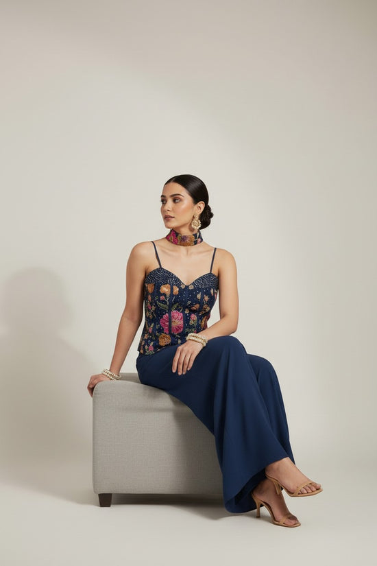 Rangoli navy blue corset top with floral embroidery and wide leg palazzo pants.