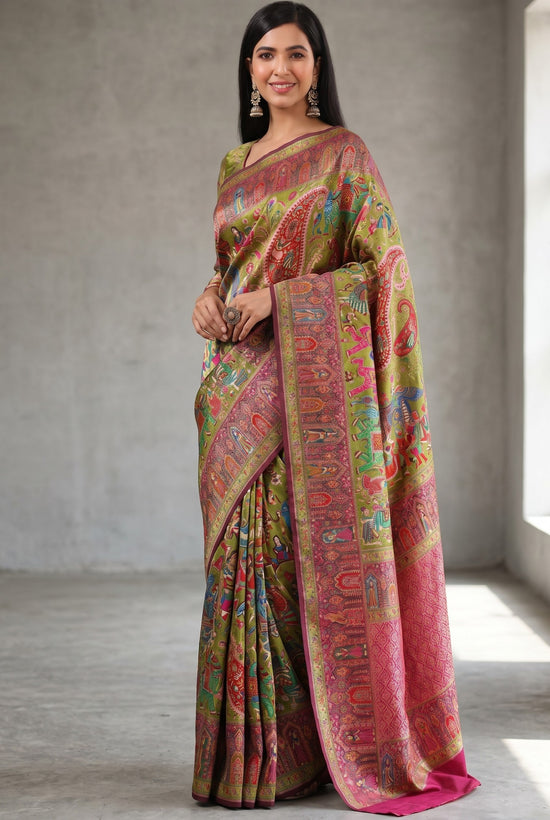 Rangoli olive green silk Kanjeevaram saree with intricate motifs and magenta border, worn by a model.