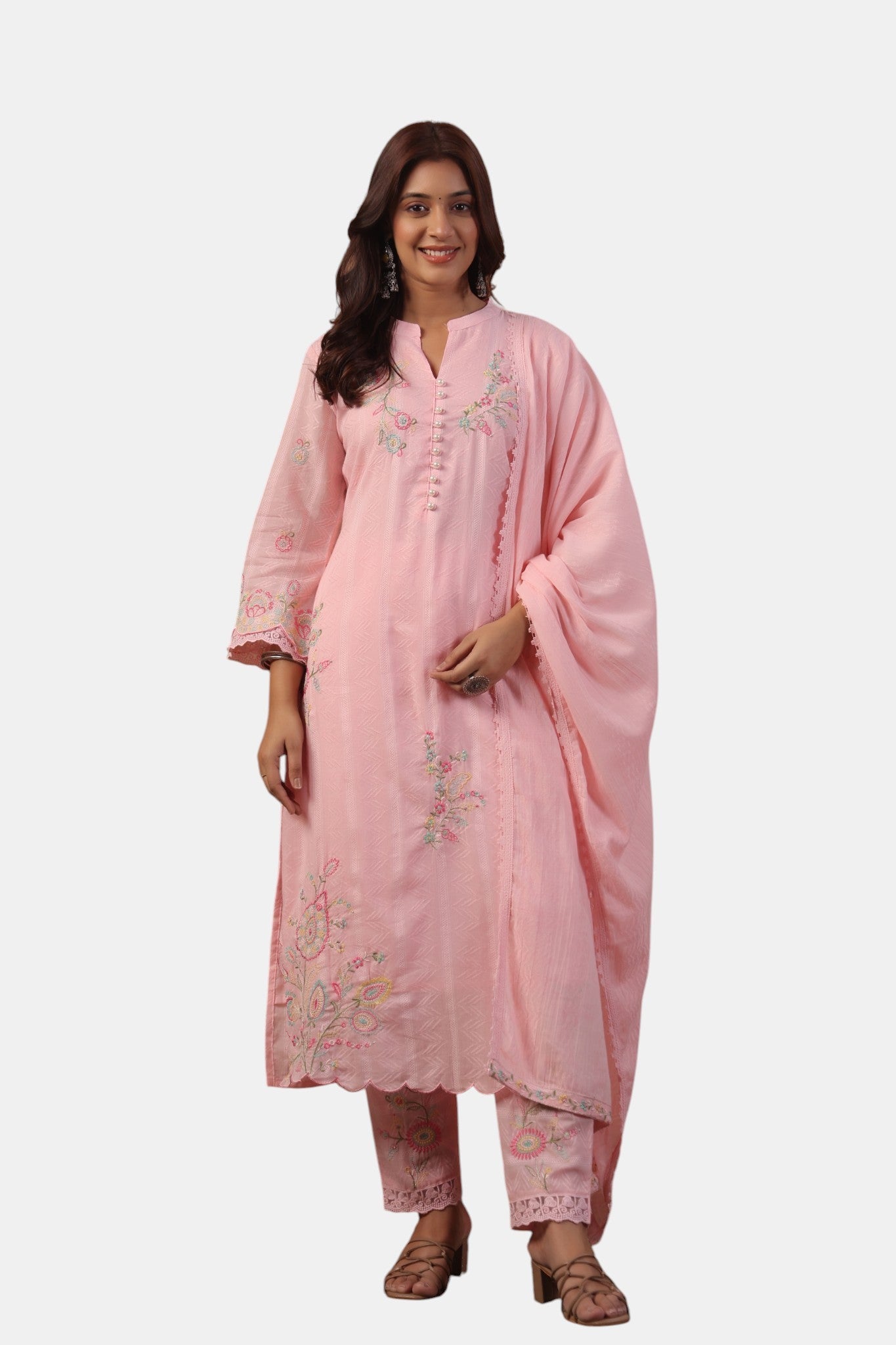 Rangoli pink cotton kurta set with floral embroidery, V-neck, button detail, scalloped hem, and matching trousers and dupatta.