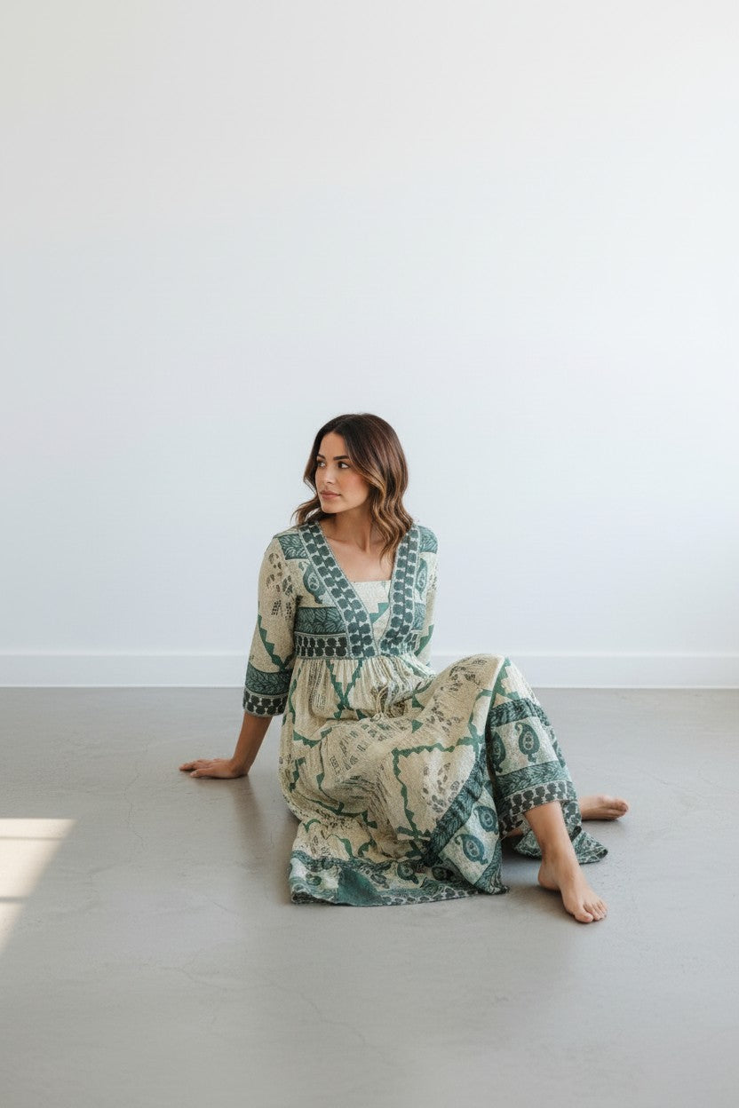 Rangoli tiered maxi dress with V-neckline in cream and deep teal vintage print. Lightweight, flowing bohemian style.